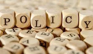 Image of wooden tiles that spell the word policy